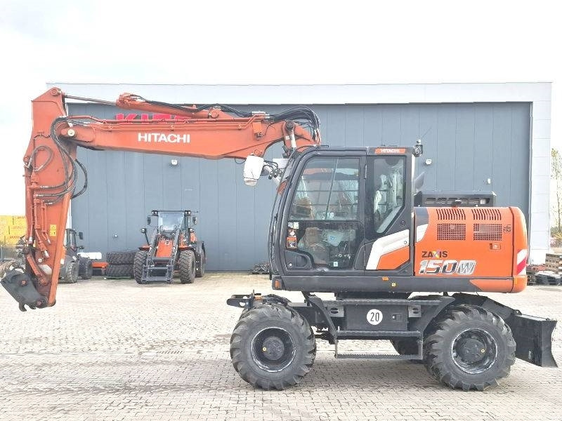Hitachi ZX 150 W-7 - Riteņu ekskavators: foto 1 Hitachi ZX 150 W-7 - Riteņu ekskavators: foto 1