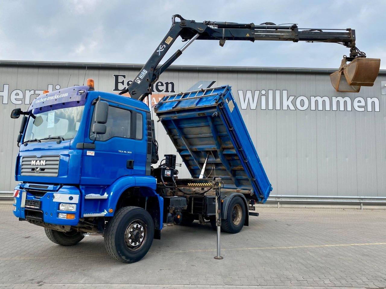 MAN TGA 18.360 4x4H BL Hiab Kran*Dautel Kipper*Klima - Kravas automašīna pašizgāzējs, Kravas auto ar manipulatoru: foto 1 MAN TGA 18.360 4x4H BL Hiab Kran*Dautel Kipper*Klima - Kravas automašīna pašizgāzējs, Kravas auto ar manipulatoru: foto 1