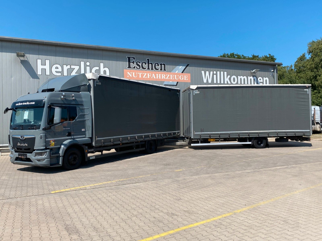 MAN TGM 15.250 + Redos Anhänger GESAMTZUG|Durchlader - Kravas automašīna ar tentu: foto 1 MAN TGM 15.250 + Redos Anhänger GESAMTZUG|Durchlader - Kravas automašīna ar tentu: foto 1