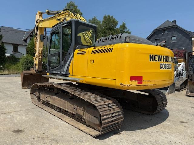 New Holland Kobelco E 215 C - Kāpurķēžu ekskavators: foto 4 New Holland Kobelco E 215 C - Kāpurķēžu ekskavators: foto 4