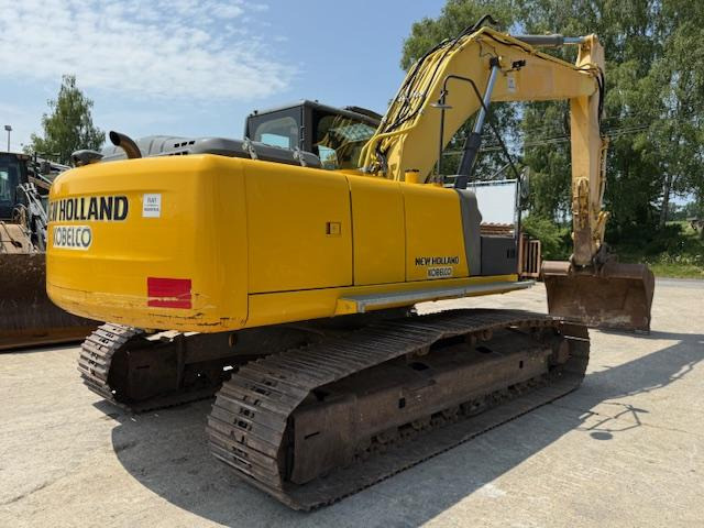 New Holland Kobelco E 215 C - Kāpurķēžu ekskavators: foto 3 New Holland Kobelco E 215 C - Kāpurķēžu ekskavators: foto 3