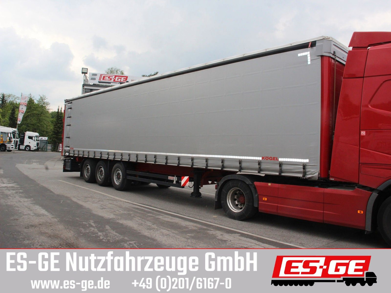 Kögel 3-Achs-Cargo-Coil-Pritschensattelanhänger Kögel 3-Achs-Cargo-Coil-Pritschensattelanhänger - Tenta puspiekabe: foto 1 Kögel 3-Achs-Cargo-Coil-Pritschensattelanhänger Kögel 3-Achs-Cargo-Coil-Pritschensattelanhänger - Tenta puspiekabe: foto 1