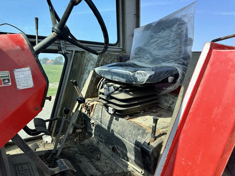 Massey Ferguson 590 - Traktors: foto 4 Massey Ferguson 590 - Traktors: foto 4