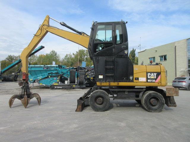 Caterpillar M313D - Atkritumu iekrāvējs: foto 2 Caterpillar M313D - Atkritumu iekrāvējs: foto 2