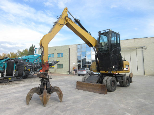 Caterpillar M313D - Atkritumu iekrāvējs: foto 4 Caterpillar M313D - Atkritumu iekrāvējs: foto 4