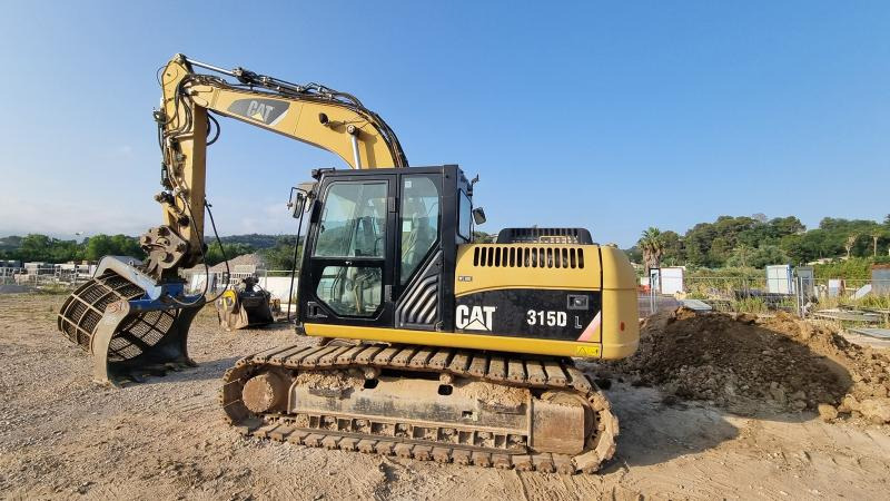 Caterpillar 315DL - Kāpurķēžu ekskavators: foto 1 Caterpillar 315DL - Kāpurķēžu ekskavators: foto 1