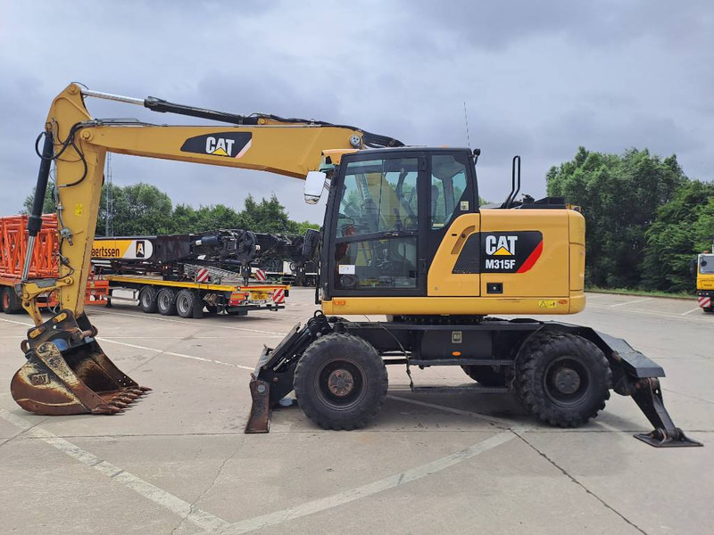Cat M315F - Riteņu ekskavators: foto 1 Cat M315F - Riteņu ekskavators: foto 1