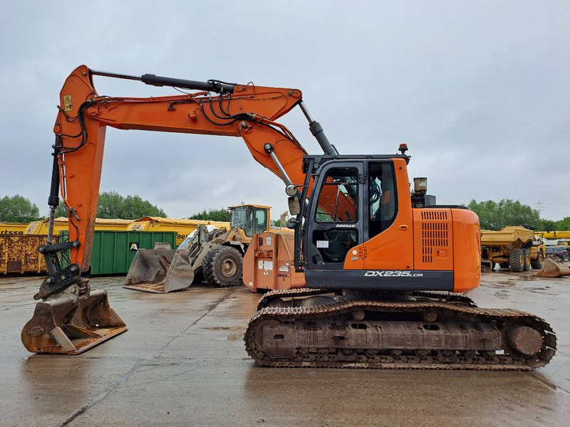 Doosan DX235LCR-5 (+ 3 Buckets) - Kāpurķēžu ekskavators: foto 1 Doosan DX235LCR-5 (+ 3 Buckets) - Kāpurķēžu ekskavators: foto 1