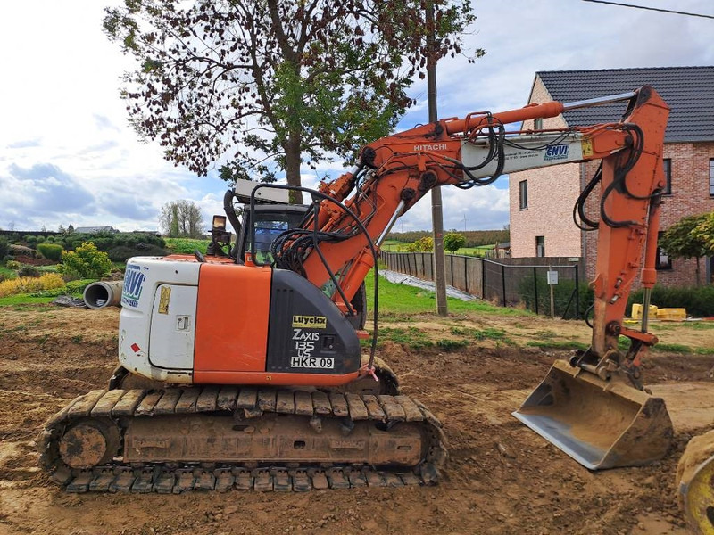 Hitachi ZX135US - Kāpurķēžu ekskavators: foto 5 Hitachi ZX135US - Kāpurķēžu ekskavators: foto 5