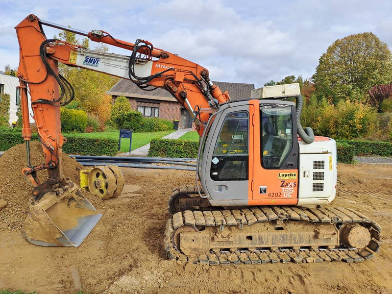 Hitachi ZX135US - Kāpurķēžu ekskavators: foto 1 Hitachi ZX135US - Kāpurķēžu ekskavators: foto 1