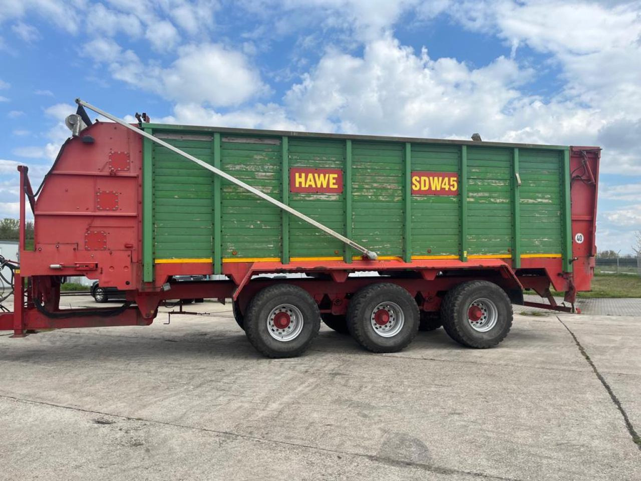 HAWE Tridem SDW 45T, Silagewagen - Lauksaimniecības piekabe-pašizgāzējs: foto 1 HAWE Tridem SDW 45T, Silagewagen - Lauksaimniecības piekabe-pašizgāzējs: foto 1