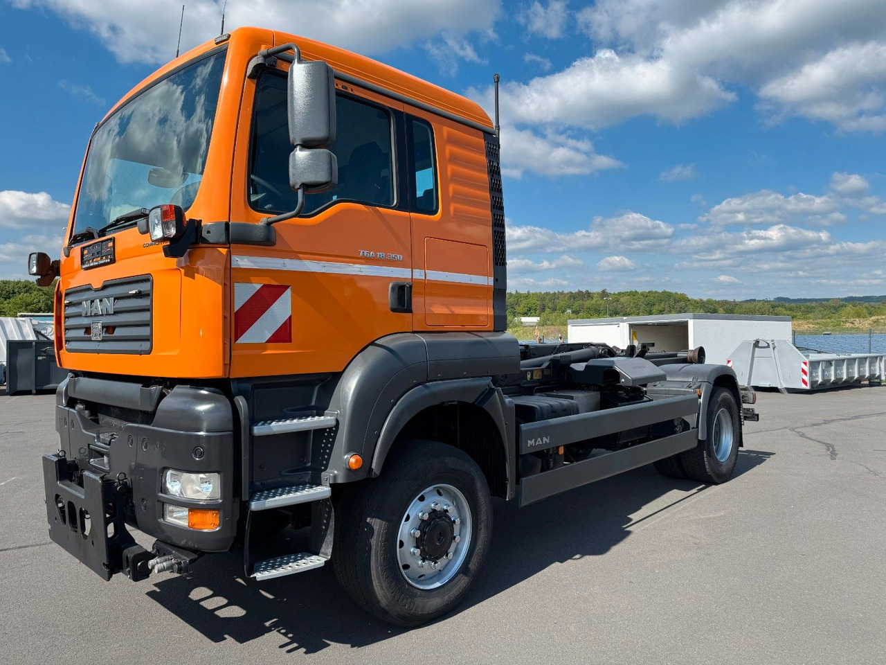 MAN TGA 18.350 4x4 Meiler Abroller RK 14.45 Winterd. - Pacēlājs ar āķi: foto 1 MAN TGA 18.350 4x4 Meiler Abroller RK 14.45 Winterd. - Pacēlājs ar āķi: foto 1