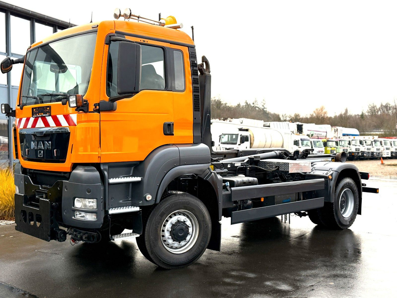 MAN TGS 18.360 4x4 Winterdienst Meiller Abroller - Pacēlājs ar āķi: foto 1 MAN TGS 18.360 4x4 Winterdienst Meiller Abroller - Pacēlājs ar āķi: foto 1