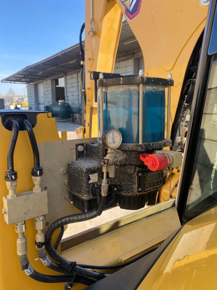 Ekskavators-iekrāvējs CAT 444 4x4: foto 12