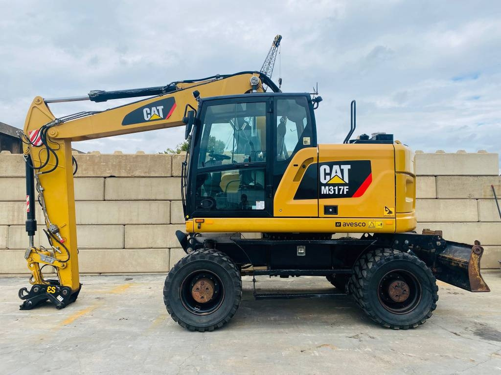 CAT m317f - Riteņu ekskavators: foto 1 CAT m317f - Riteņu ekskavators: foto 1