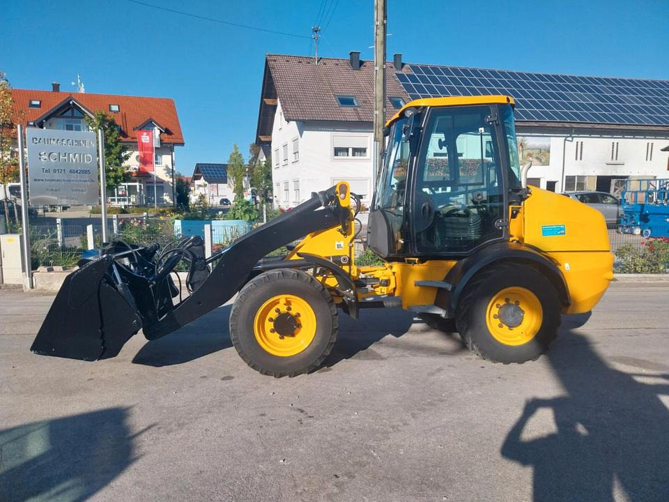 Radlader JCB 409 Hoflader Lader Schaufellader - Mini iekrāvējs: foto 1 Radlader JCB 409 Hoflader Lader Schaufellader - Mini iekrāvējs: foto 1