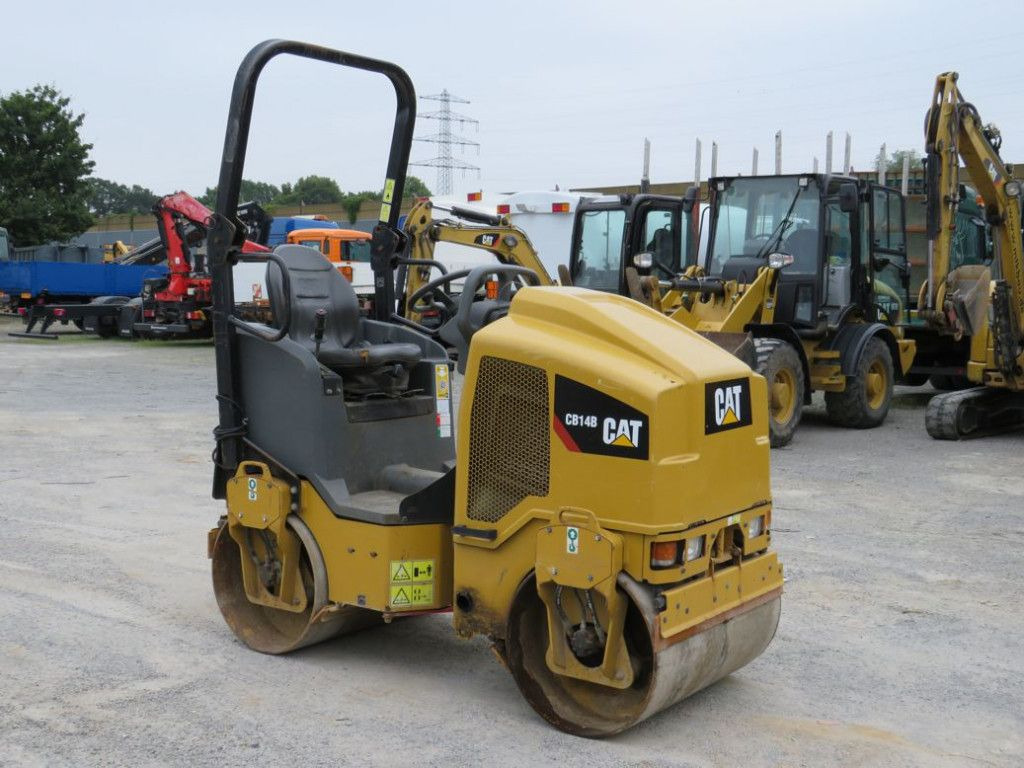 CAT Tandem-Vibrationswalze CB14 B Baumaschine - Veltnis: foto 2 CAT Tandem-Vibrationswalze CB14 B Baumaschine - Veltnis: foto 2