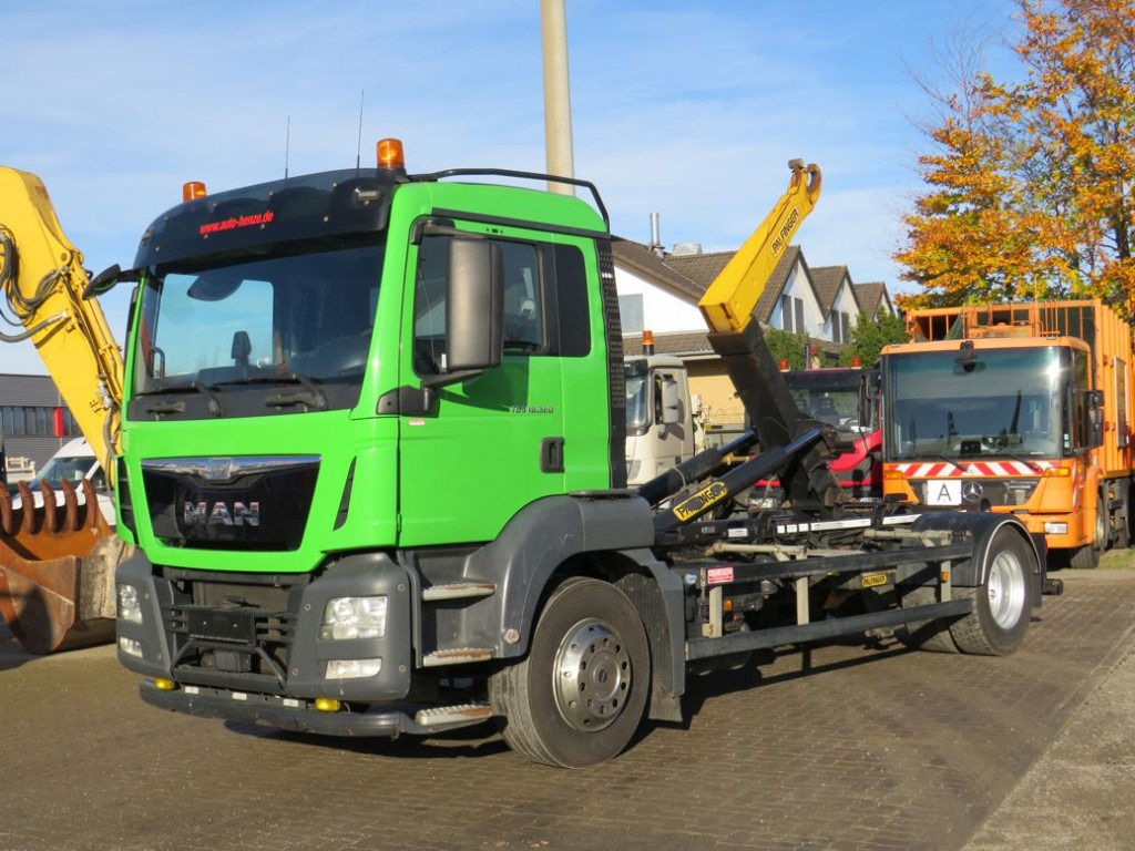 MAN TG-S 18.320 BL Abrollkipper - Pacēlājs ar āķi: foto 1 MAN TG-S 18.320 BL Abrollkipper - Pacēlājs ar āķi: foto 1