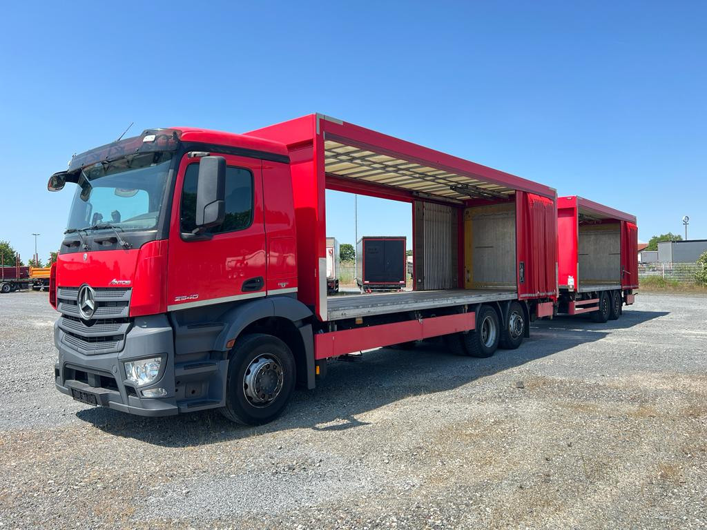 MERCEDES-BENZ Antos 2540 L 6x2 Pritsche LBW Coca Cola LBW 2to - Kravas automašīna ar tentu: foto 1 MERCEDES-BENZ Antos 2540 L 6x2 Pritsche LBW Coca Cola LBW 2to - Kravas automašīna ar tentu: foto 1