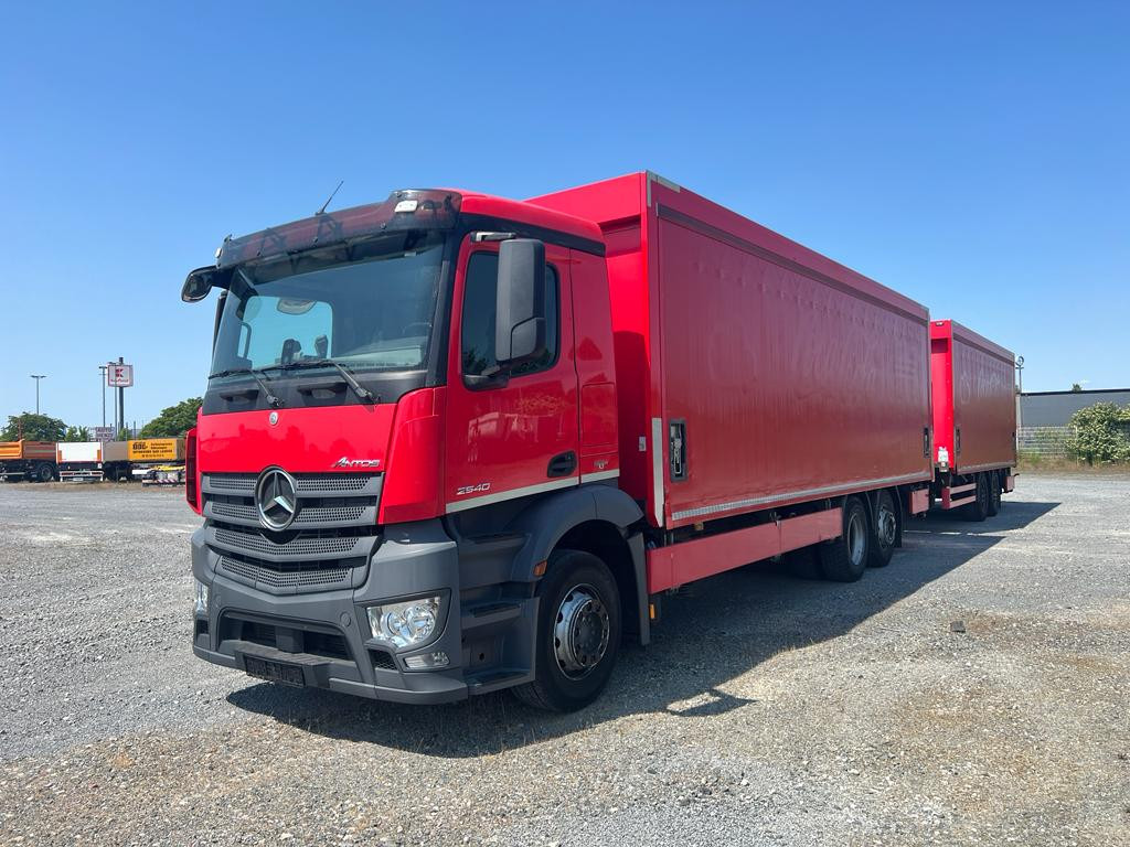 MERCEDES-BENZ Antos 2540 L 6x2 Pritsche LBW Coca Cola - Kravas automašīna ar tentu: foto 1 MERCEDES-BENZ Antos 2540 L 6x2 Pritsche LBW Coca Cola - Kravas automašīna ar tentu: foto 1