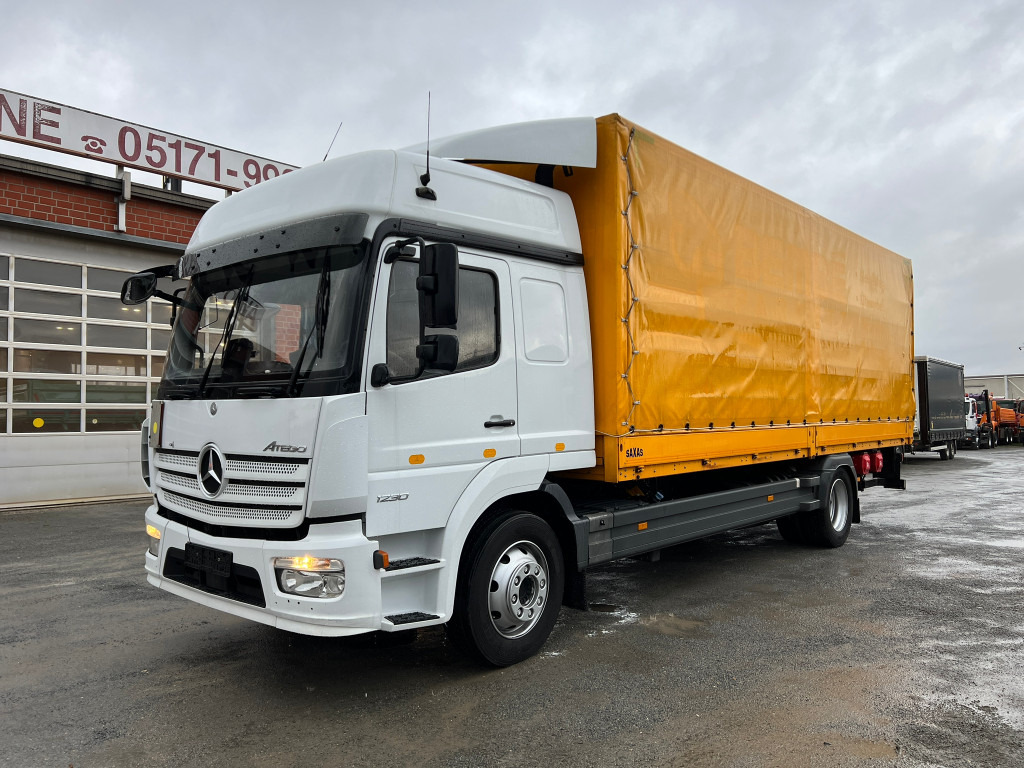 MERCEDES-BENZ Atego 1230 L Pritsche LBW Lg.Fhs Hochd. 7,2m+LBW - Kravas automašīna ar tentu: foto 1 MERCEDES-BENZ Atego 1230 L Pritsche LBW Lg.Fhs Hochd. 7,2m+LBW - Kravas automašīna ar tentu: foto 1