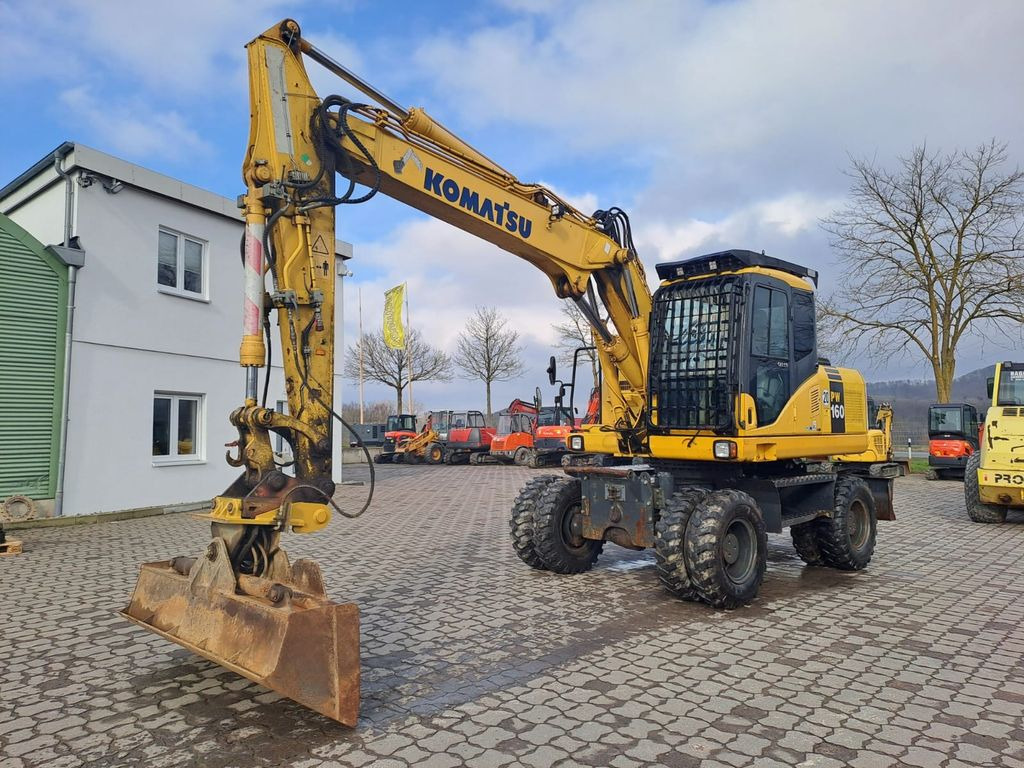Komatsu PW 160-7, Bj 07, 7050 BH, hydr. VA, MS10, GLV - Riteņu ekskavators: foto 1 Komatsu PW 160-7, Bj 07, 7050 BH, hydr. VA, MS10, GLV - Riteņu ekskavators: foto 1