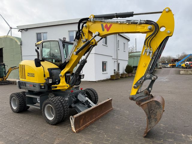 Wacker EW 65, Bj 23, 1200 BH, hydr. VA, Klima, wie neu - Riteņu ekskavators: foto 1 Wacker EW 65, Bj 23, 1200 BH, hydr. VA, Klima, wie neu - Riteņu ekskavators: foto 1