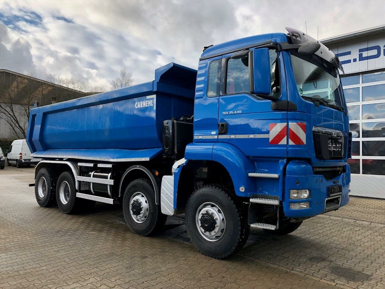 MAN TGS 35.440 8x8 Euro 5 Muldenkipper Carnehl 17m3 - Kravas automašīna pašizgāzējs: foto 1 MAN TGS 35.440 8x8 Euro 5 Muldenkipper Carnehl 17m3 - Kravas automašīna pašizgāzējs: foto 1