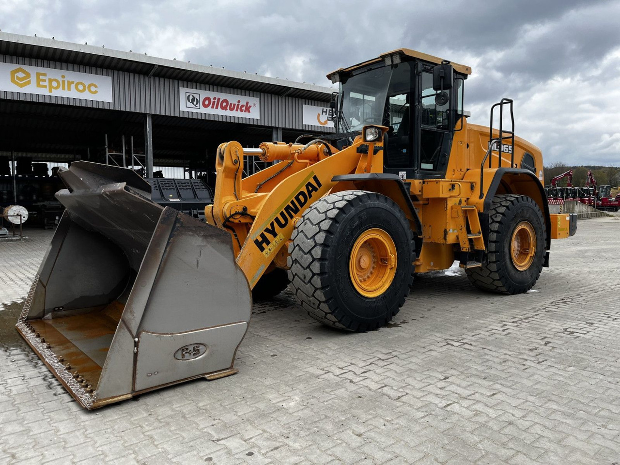 Hyundai HL 965 - Riteņu iekrāvējs: foto 1 Hyundai HL 965 - Riteņu iekrāvējs: foto 1