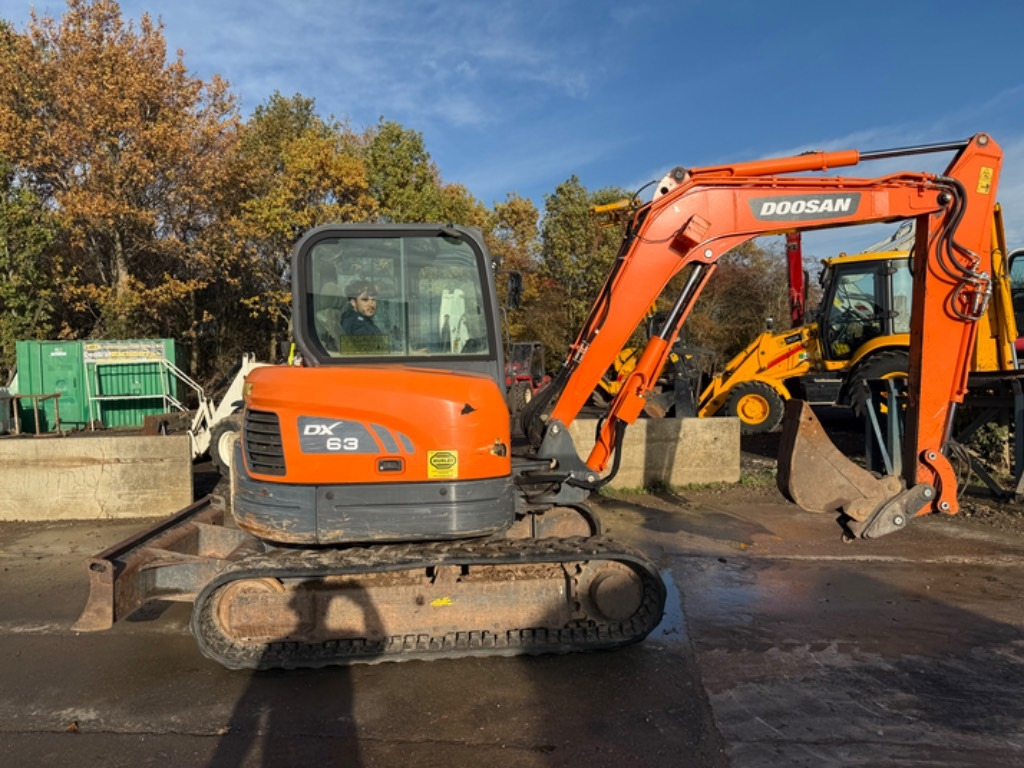 Doosan DX 63-3 - Mini-ekskavators: foto 1 Doosan DX 63-3 - Mini-ekskavators: foto 1