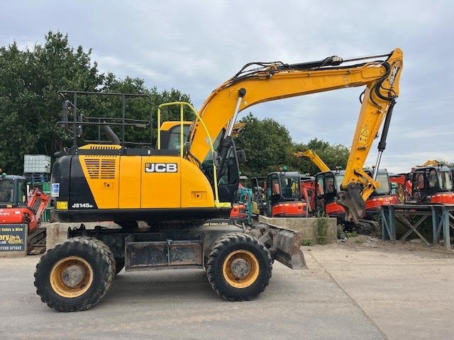 JCB JS 145 W - Riteņu ekskavators: foto 1 JCB JS 145 W - Riteņu ekskavators: foto 1