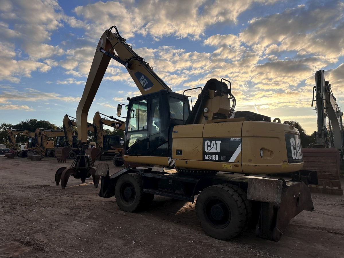 CATERPILLAR M 318 MH mit Greifer Kein 3022 3026 320 322 - Riteņu ekskavators: foto 4 CATERPILLAR M 318 MH mit Greifer Kein 3022 3026 320 322 - Riteņu ekskavators: foto 4