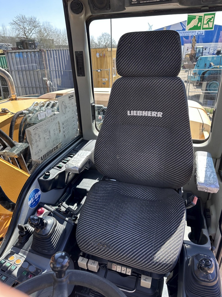 Riteņu ekskavators LIEBHERR A 314 All hydr. lines SW 33- 30 Km/h: foto 14