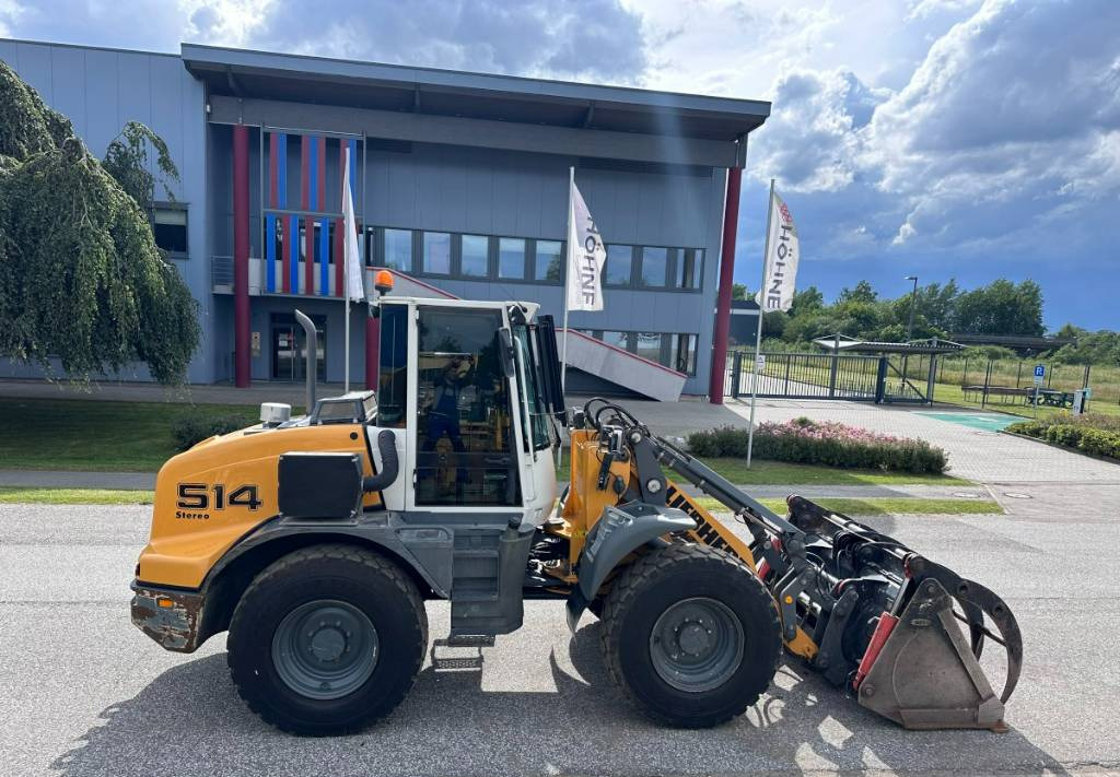 Liebherr L 514 Stereo +30 Kmh Klima 3er Kreis Greifschaufel - Riteņu iekrāvējs: foto 2 Liebherr L 514 Stereo +30 Kmh Klima 3er Kreis Greifschaufel - Riteņu iekrāvējs: foto 2