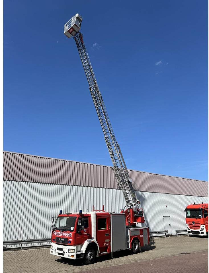 MAN LE 15.255 4x2 LLC Doka, Metz DLA-K 12/9 Drehleiter LE 15.255 4x2 LLC Doka, Metz DLA-K 12/9 Feuerwehr Drehleiter - Ātrās palīdzības mašīna: foto 1 MAN LE 15.255 4x2 LLC Doka, Metz DLA-K 12/9 Drehleiter LE 15.255 4x2 LLC Doka, Metz DLA-K 12/9 Feuerwehr Drehleiter - Ātrās palīdzības mašīna: foto 1