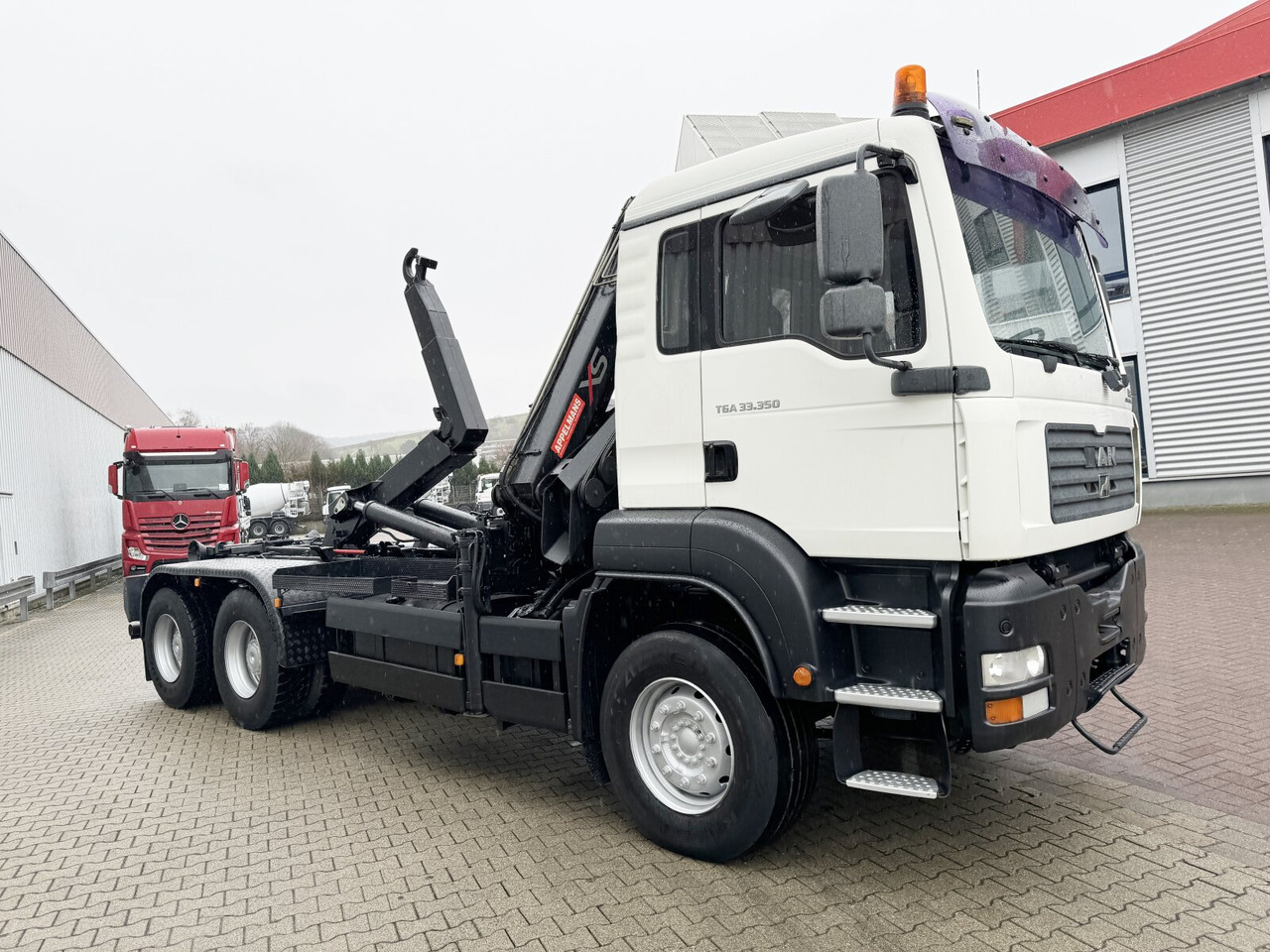 MAN TGA 33.350 6X4 BB TGA 33.350 6X4 BB mit Kran Hiab 166 E-3 HiDuo, Funk līzingu MAN TGA 33.350 6X4 BB TGA 33.350 6X4 BB mit Kran Hiab 166 E-3 HiDuo, Funk: foto 10