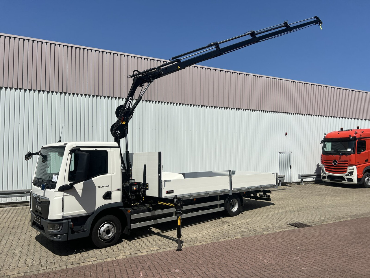 MAN TGL 12.190 4x2 BL TGL 12.190 4x2 BL mit Kran Hiab Hiduo 072DS-4 - Kravas auto ar manipulatoru: foto 1 MAN TGL 12.190 4x2 BL TGL 12.190 4x2 BL mit Kran Hiab Hiduo 072DS-4 - Kravas auto ar manipulatoru: foto 1