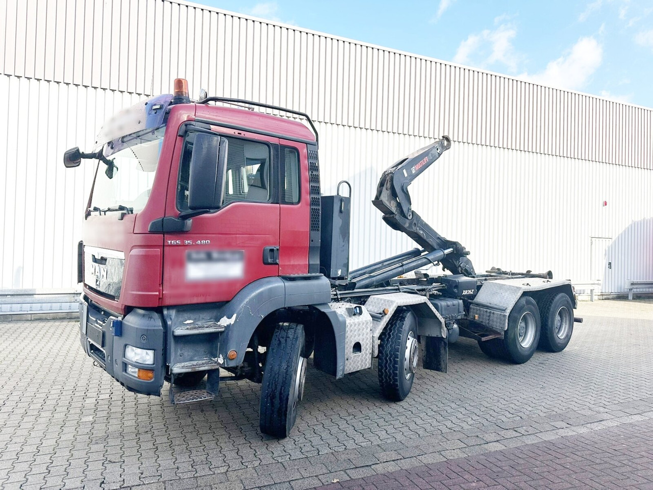 MAN TGS 35.480 8X4 BL TGS 35.400 8x4 BL, Schub-Knick bis 6,5m Container - Pacēlājs ar āķi: foto 1 MAN TGS 35.480 8X4 BL TGS 35.400 8x4 BL, Schub-Knick bis 6,5m Container - Pacēlājs ar āķi: foto 1