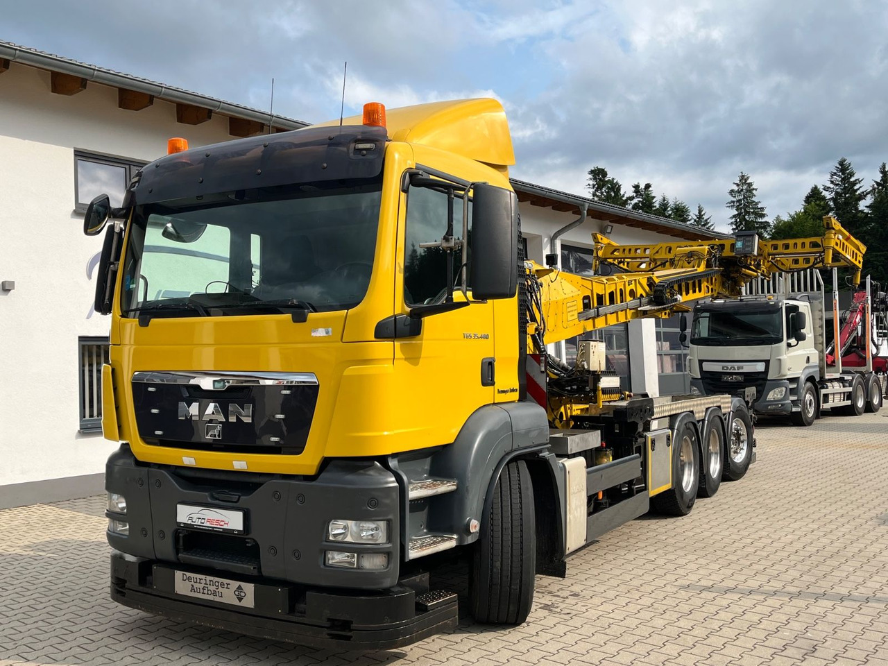 MAN TGS 35.480 8x4-4BL Deuringer Garagentransporter - Kravas auto ar manipulatoru: foto 1 MAN TGS 35.480 8x4-4BL Deuringer Garagentransporter - Kravas auto ar manipulatoru: foto 1