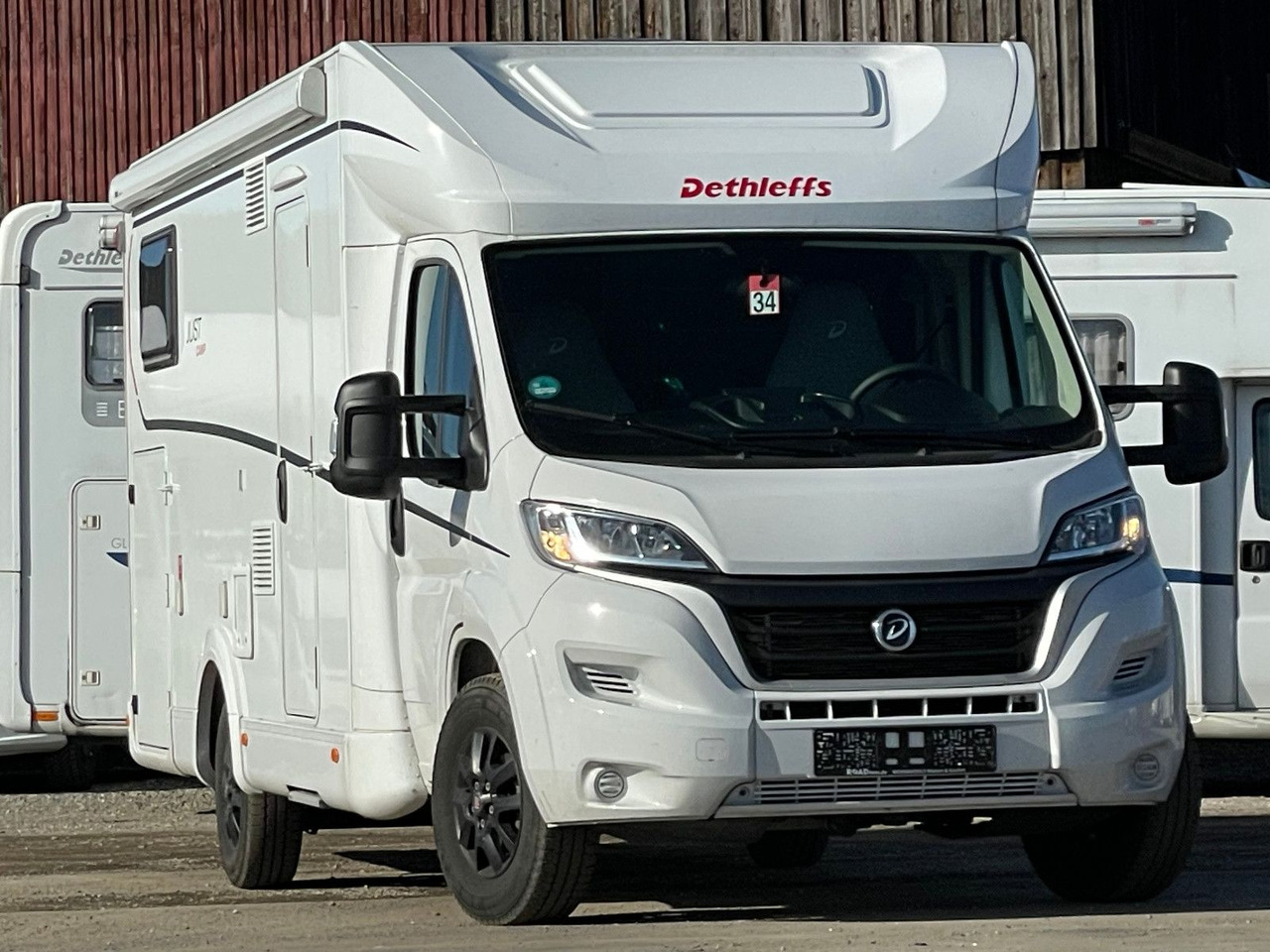 Dethleffs Just T 7052 EB mit Hubbett,Fiat,Markise,RFK,Navi - Daļēji integrētais kemperis: foto 1 Dethleffs Just T 7052 EB mit Hubbett,Fiat,Markise,RFK,Navi - Daļēji integrētais kemperis: foto 1