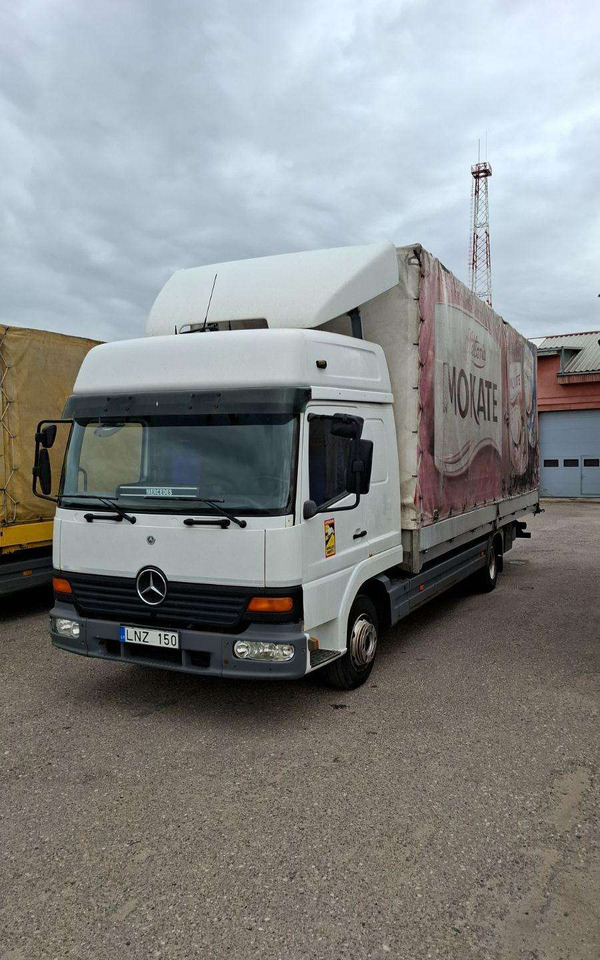 Mercedes-Benz 818 L - Kravas automašīna ar tentu: foto 1 Mercedes-Benz 818 L - Kravas automašīna ar tentu: foto 1