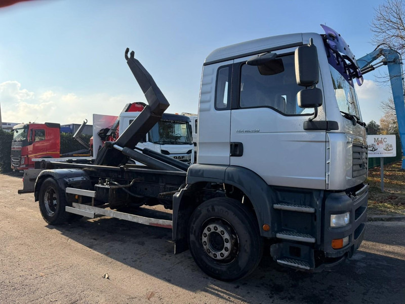 MAN TGA 18.350 4x2 19T HOOKLIFT / ABROLLKIPPER / GANCHO / AMPLIROL - EURO 3 - AS TRONIC AUTOMATIC - Pacēlājs ar āķi: foto 1 MAN TGA 18.350 4x2 19T HOOKLIFT / ABROLLKIPPER / GANCHO / AMPLIROL - EURO 3 - AS TRONIC AUTOMATIC - Pacēlājs ar āķi: foto 1