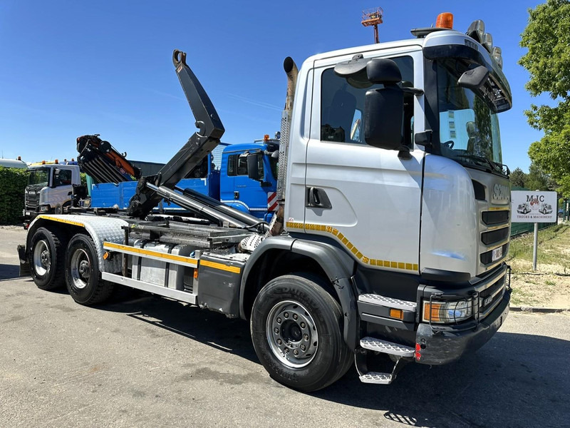 Scania G450 6x4 HOOKLIFT AJK 20T - 5760mm - 3m90 WB - HUB REDUCTION / STEEL SUSP. - EURO 6 - BE TRUCK - Pacēlājs ar āķi: foto 1 Scania G450 6x4 HOOKLIFT AJK 20T - 5760mm - 3m90 WB - HUB REDUCTION / STEEL SUSP. - EURO 6 - BE TRUCK - Pacēlājs ar āķi: foto 1