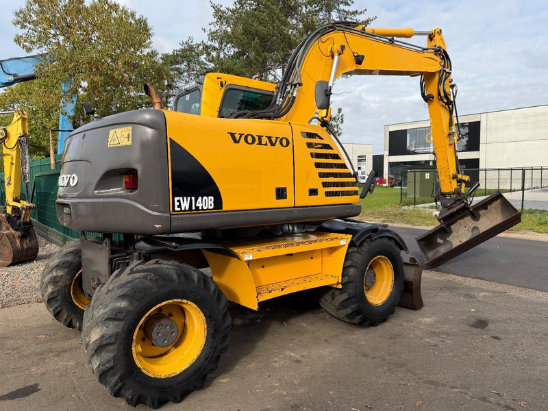 Volvo EW 140 B *FULL HYDR* - BLADE - 10.485h - TILT BUCKET - CE - NL MACHINE - GOOD CONDITION - Riteņu ekskavators: foto 3 Volvo EW 140 B *FULL HYDR* - BLADE - 10.485h - TILT BUCKET - CE - NL MACHINE - GOOD CONDITION - Riteņu ekskavators: foto 3