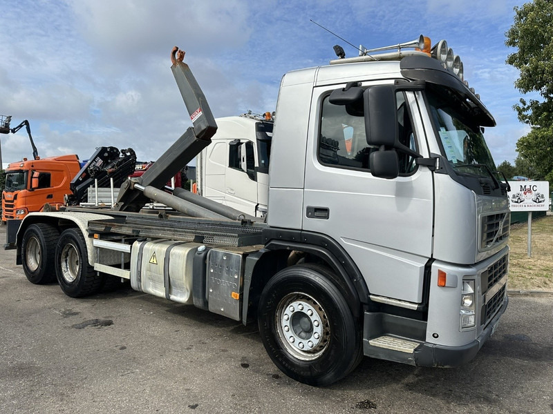 Volvo FM 400 6x4 HOOKLIFT / HAAKARM WAF 20T - EURO 5 - MANUAL - BLADVERING / STEEL SUSPENSION - TÜV 02/2026 - BE TRUCK - Pacēlājs ar āķi: foto 1 Volvo FM 400 6x4 HOOKLIFT / HAAKARM WAF 20T - EURO 5 - MANUAL - BLADVERING / STEEL SUSPENSION - TÜV 02/2026 - BE TRUCK - Pacēlājs ar āķi: foto 1