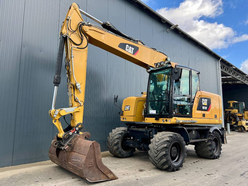 Riteņu ekskavators Cat M318F: foto 1