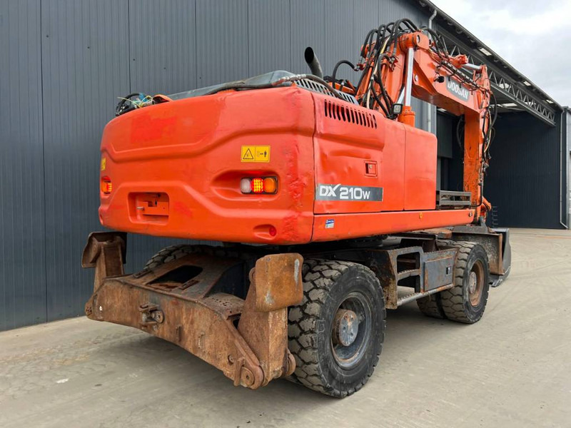 Doosan DX210W - Riteņu ekskavators: foto 4 Doosan DX210W - Riteņu ekskavators: foto 4