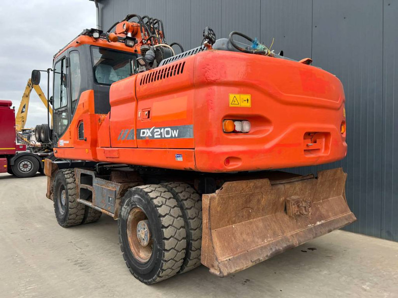 Doosan DX210W - Riteņu ekskavators: foto 2 Doosan DX210W - Riteņu ekskavators: foto 2