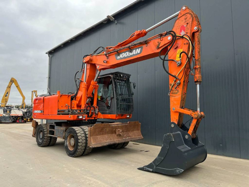Doosan DX210W - Riteņu ekskavators: foto 3 Doosan DX210W - Riteņu ekskavators: foto 3