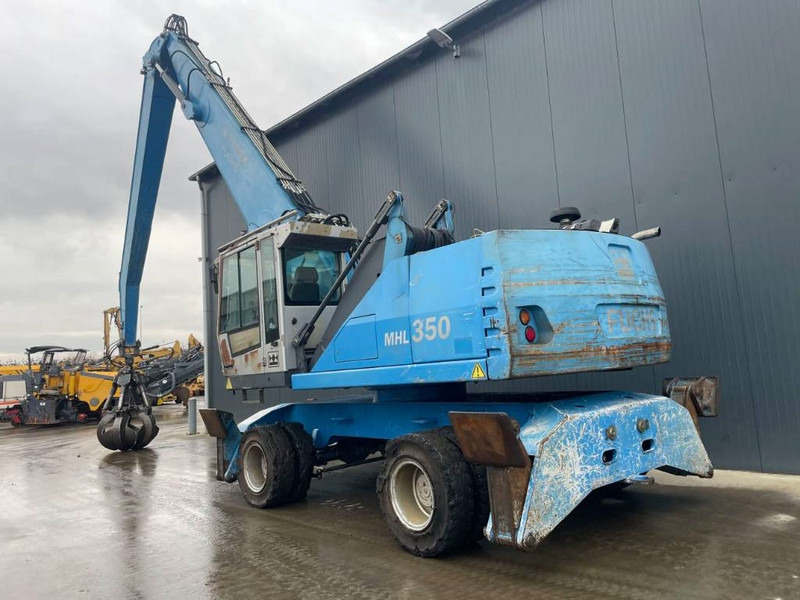 Fuchs MHL350 - Atkritumu iekrāvējs: foto 3 Fuchs MHL350 - Atkritumu iekrāvējs: foto 3